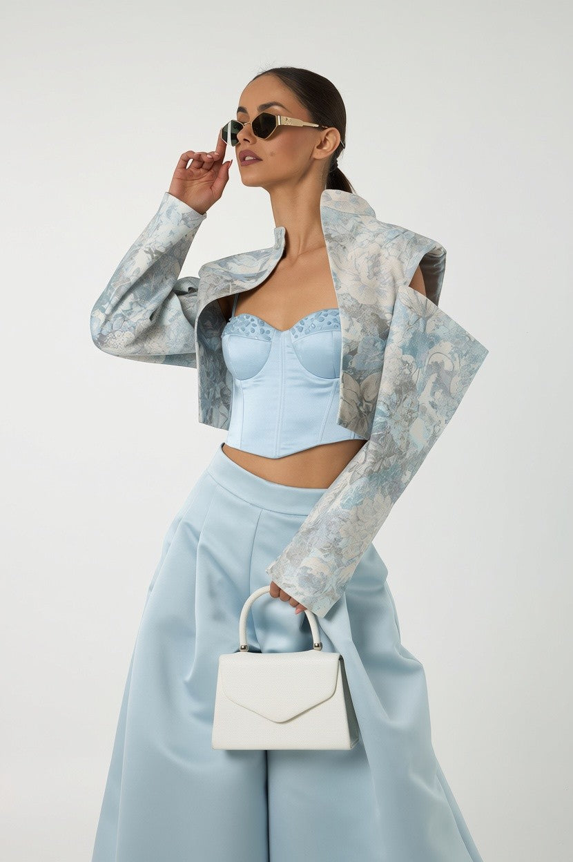 Mkeyzee London Elara Dusk corset top in soft blue silk duchess with hand-applied aquamarine stones on underwired cups