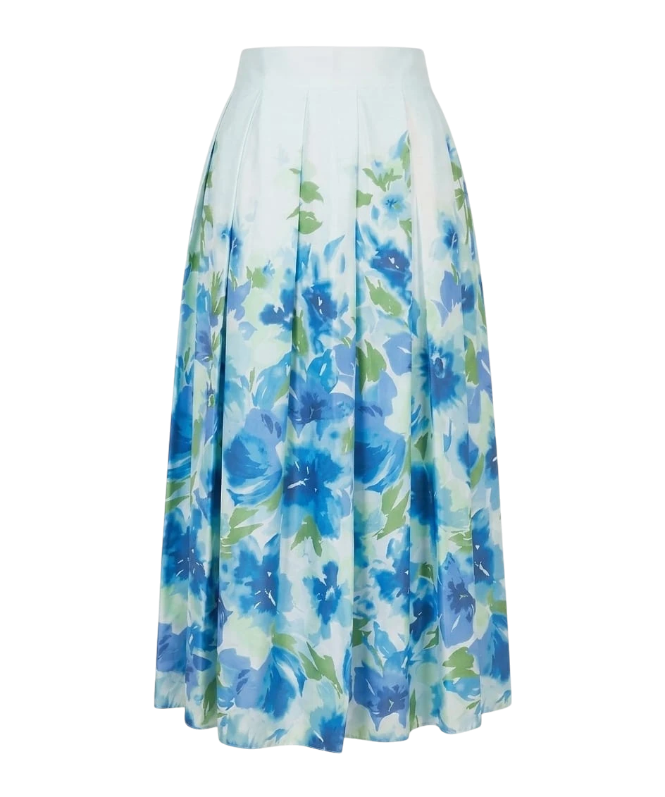 Mkeyzee London Fiorella midi skirt in white cotton with a blue floral print and pleated structure.
