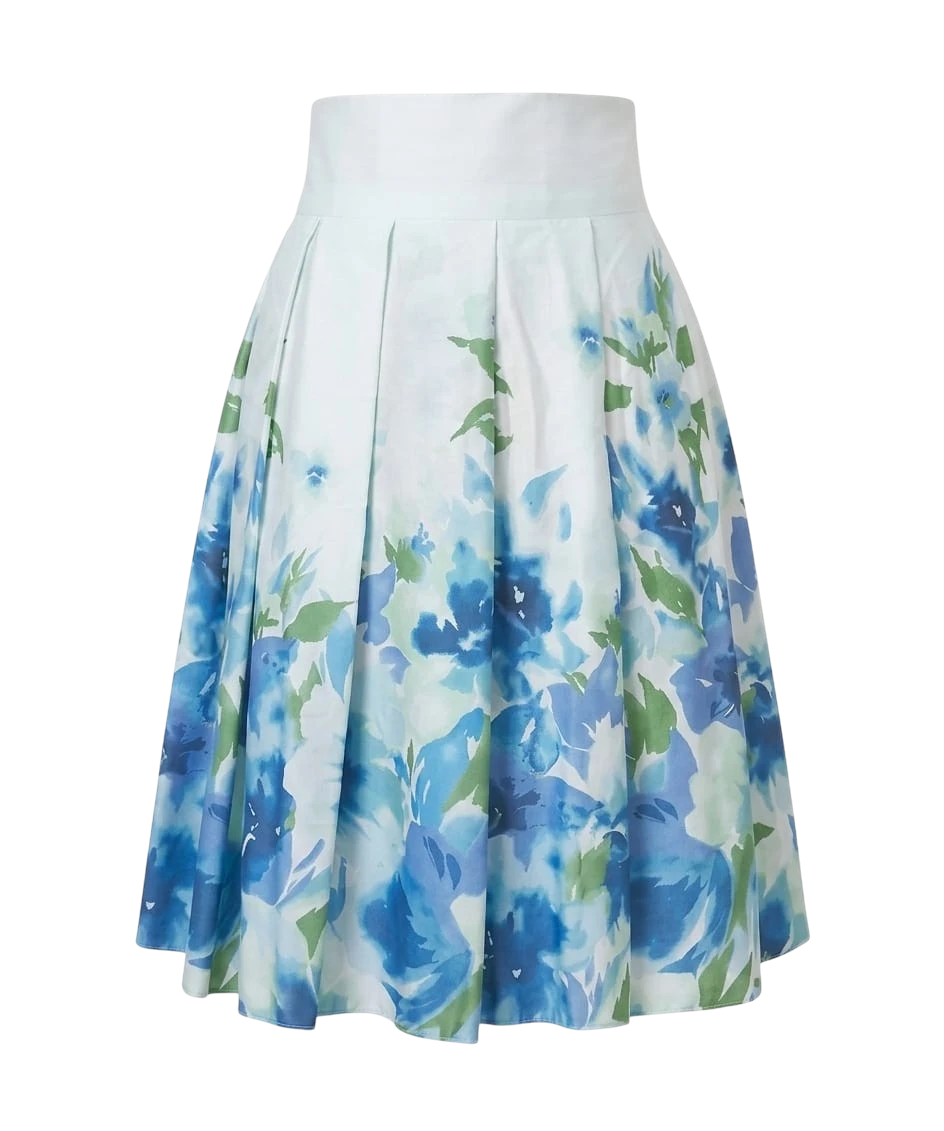Mkeyzee London Fiorella knee-length pleated skirt in white cotton with a blue floral print.