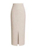 Mkeyzee London sand linen midi skirt with high waist and signature curved front seam detail.