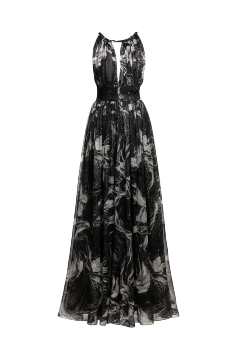 Mkeyzee London Selene silk maxi dress in black and white moon print with a draped bodice and gathered flared skirt.