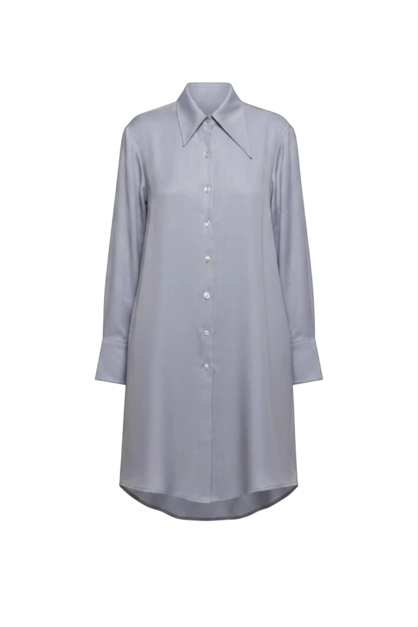 Mkeyzee London IZALIE sky mist blue 100% cotton shirt dress with an asymmetrical collar and shell button front.
