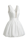 Mkeyzee London white Duchess satin mini dress with a deep V neckline, structured corset bodice, and bubble skirt.